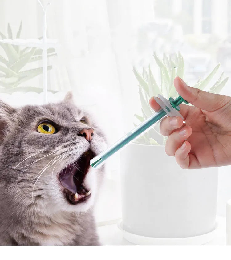 Two silicone gel pet pill shooter guns with soft tips for cats and dogs