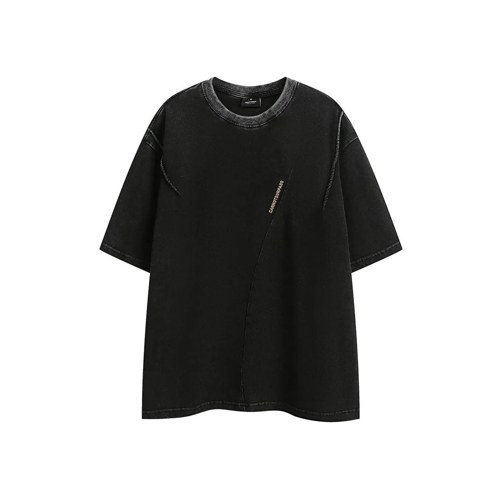 Man's loose fit retro half-sleeve t-shirt with embroidered wash finish in purple.