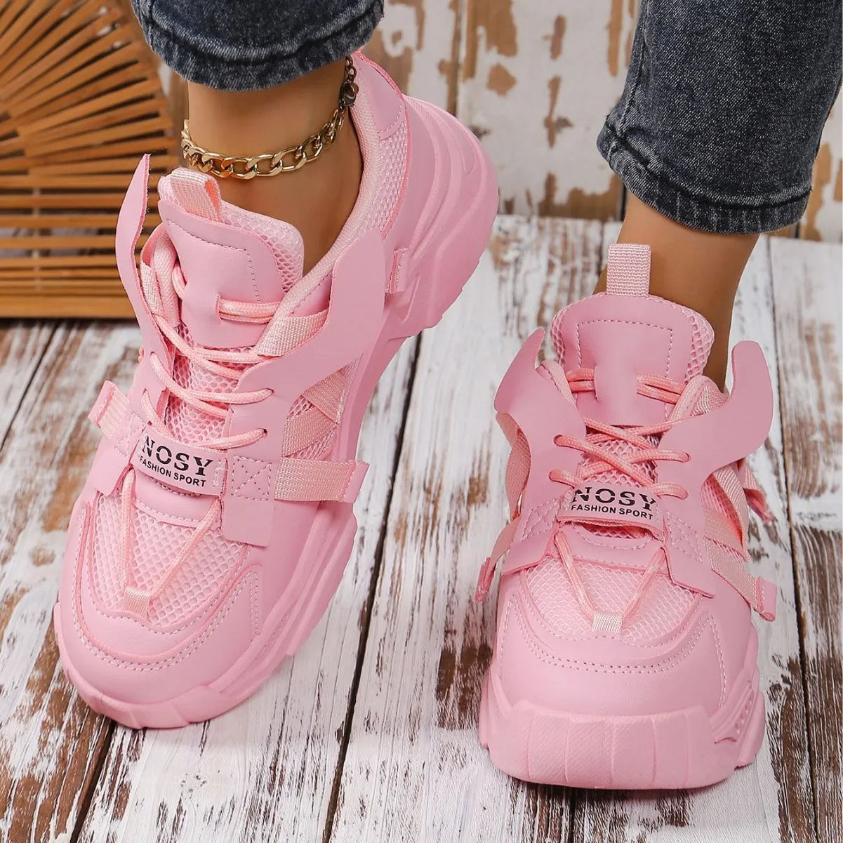 Women's purple green white pink yellow mesh platform sneakers with lace-up front and animal pattern.