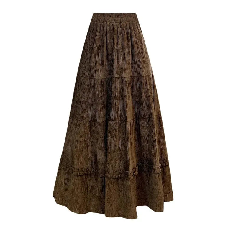 Corduroy A-line midi skirt with elastic waistband in milky white, shown on a hanger.