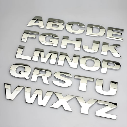 Metal zinc alloy car letter stickers showing dimensional 3D construction in black and silver finishes