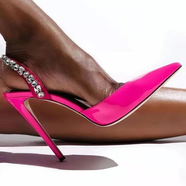 Women's pointed toe high heel sandals with rhinestone decoration on the side, in patent leather.