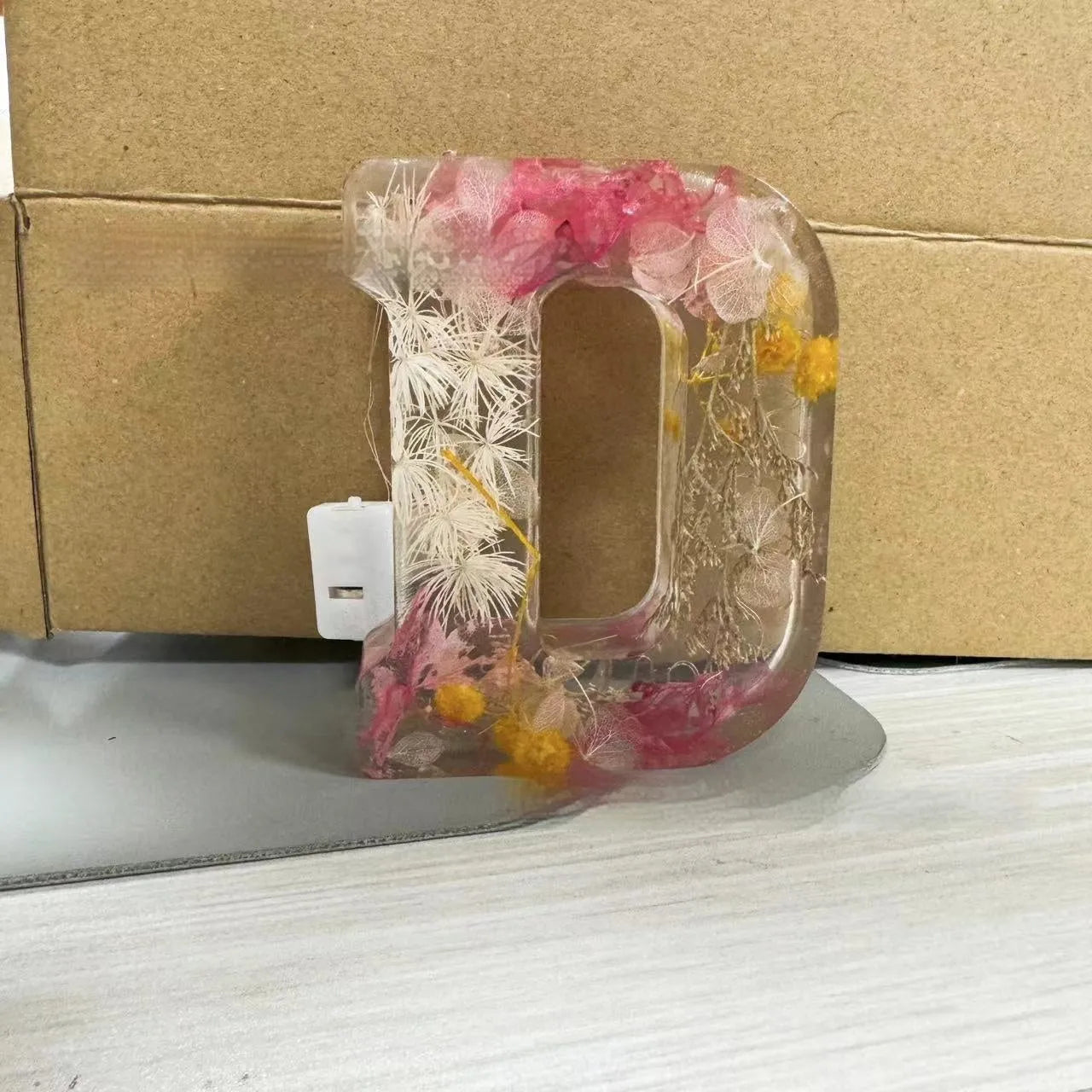 Transparent resin night light ornament with letter flower design, 15cm square, multiple colour options
