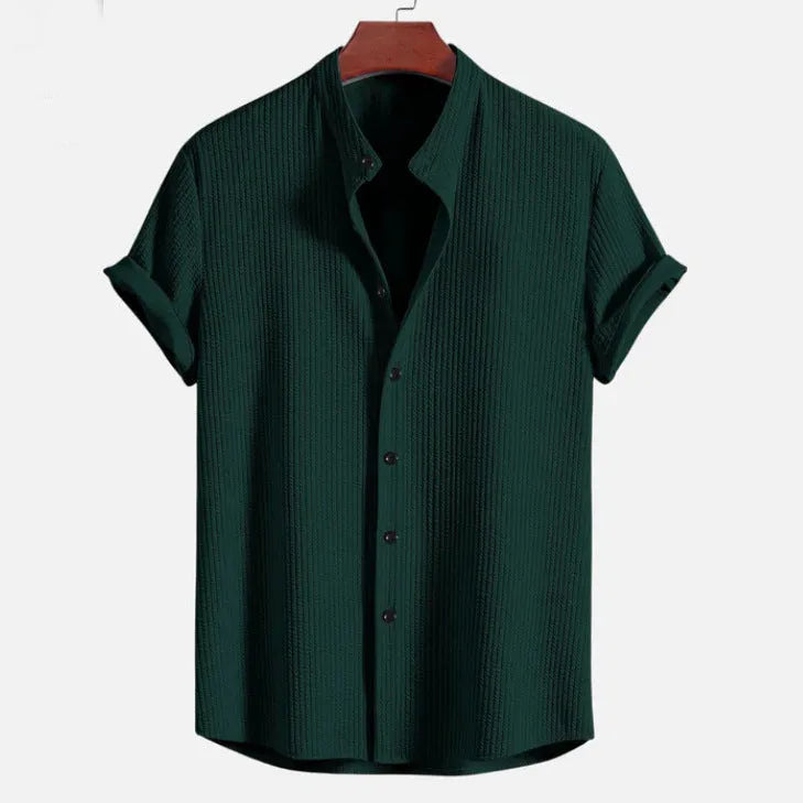 Men's loose fit short sleeve casual shirt in a solid colour on a hanger