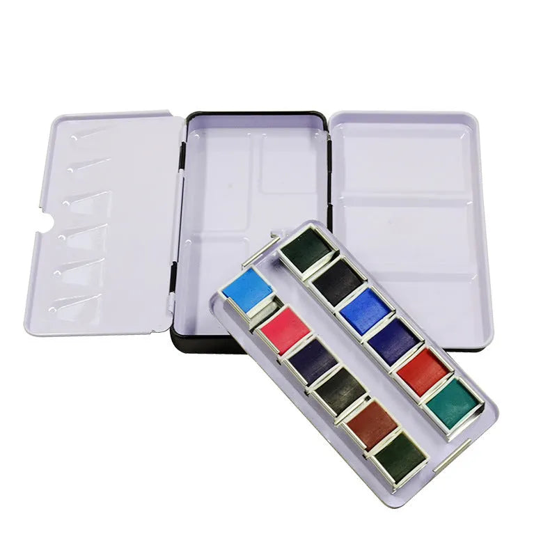 Square tinplate metal paint box for solid watercolours with folding compartment design.