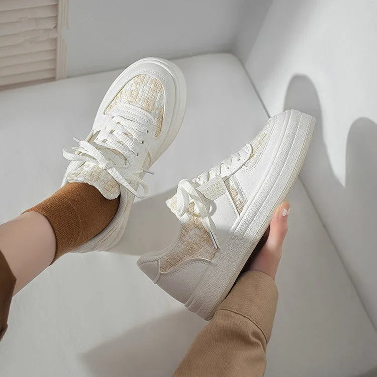 Beige plaid platform sports shoes with mesh lining and a white rubber sole.