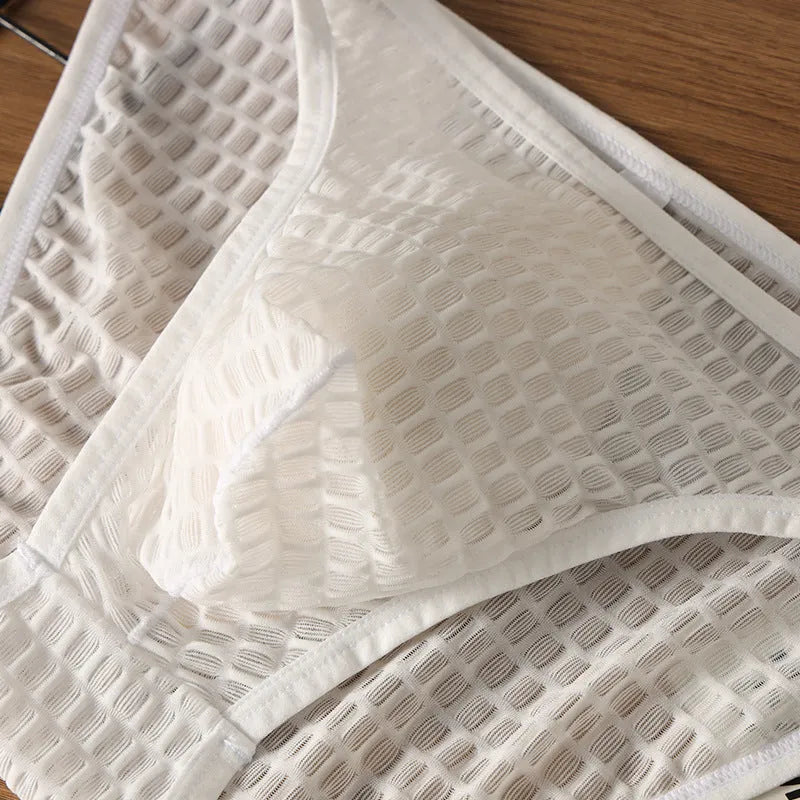Men's low waist transparent lace underwear shorts in white, black, green, light purple, and rose red.