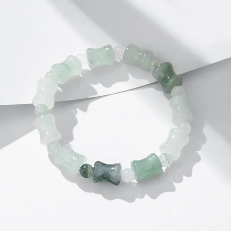 Tianshan Emerald natural chalcedony diamond-shaped stone bracelet with coconut shell beads and safety lock on elastic string.
