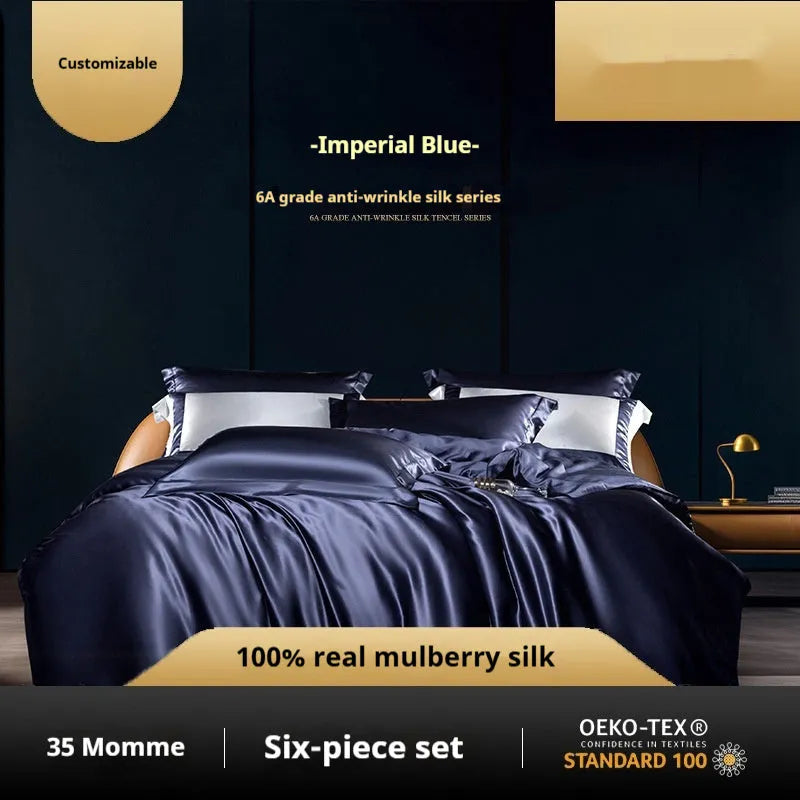 Silk four-piece bed set in a solid colour showing duvet cover and matching pillowcases.