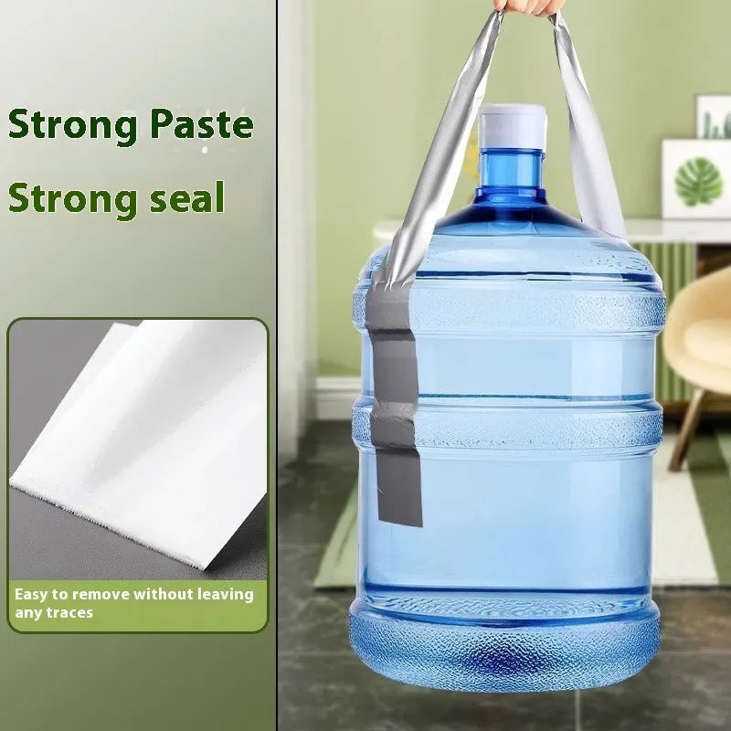 Roll of high-adhesion windproof sealing tape in transparent colour on a windowsill.