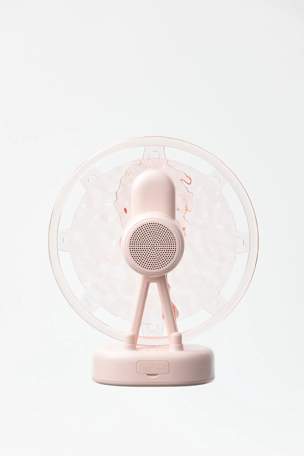 Pink and white Bluetooth speaker projecting colourful Ferris wheel and water ripple LED light patterns