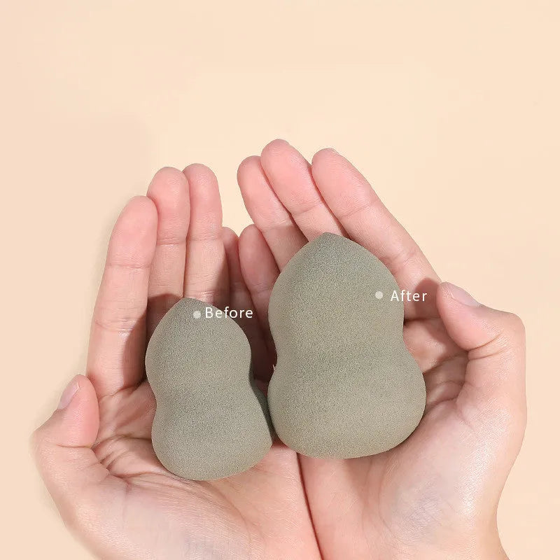 Four coloured hydrophilic polyurethane beauty eggs placed on a metal stand for makeup application