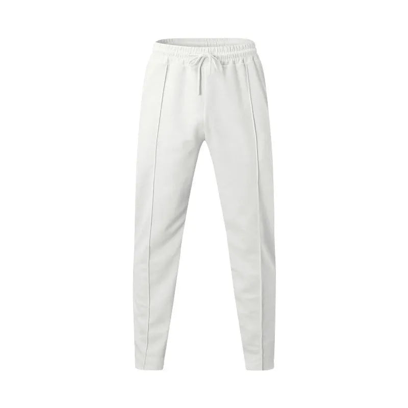 Men's loose straight trousers in waffle polyester with drawstring, available in multiple colours including black and light grey