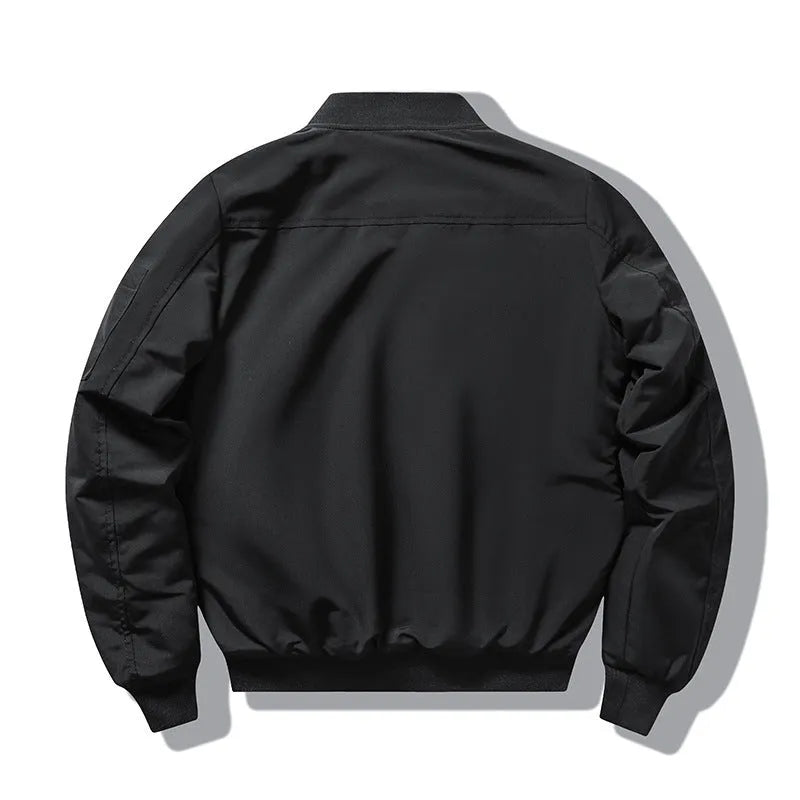 Man wearing a slim-fit black retro motorcycle jacket with stand collar and quilted padding.