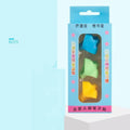 Silicone pencil grip with finger guides for child's thumb, index, and middle finger in tripod position.