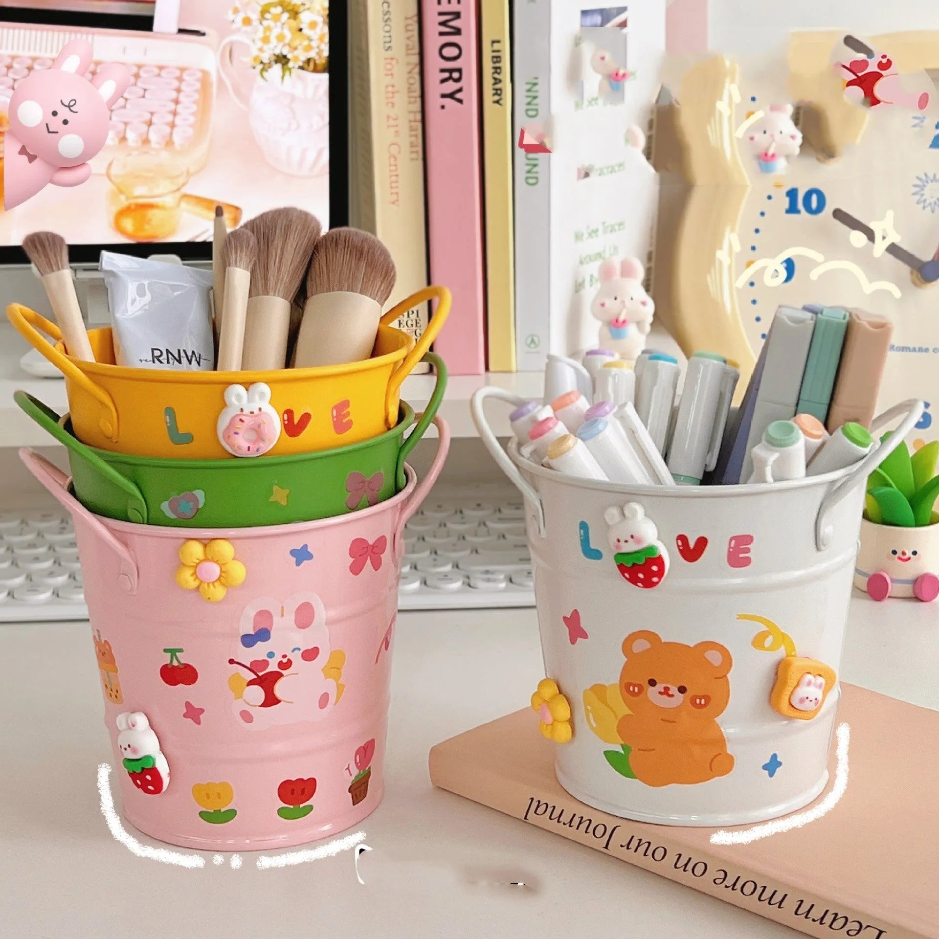 Round metal creative iron art pen holder in various colours on a desk.