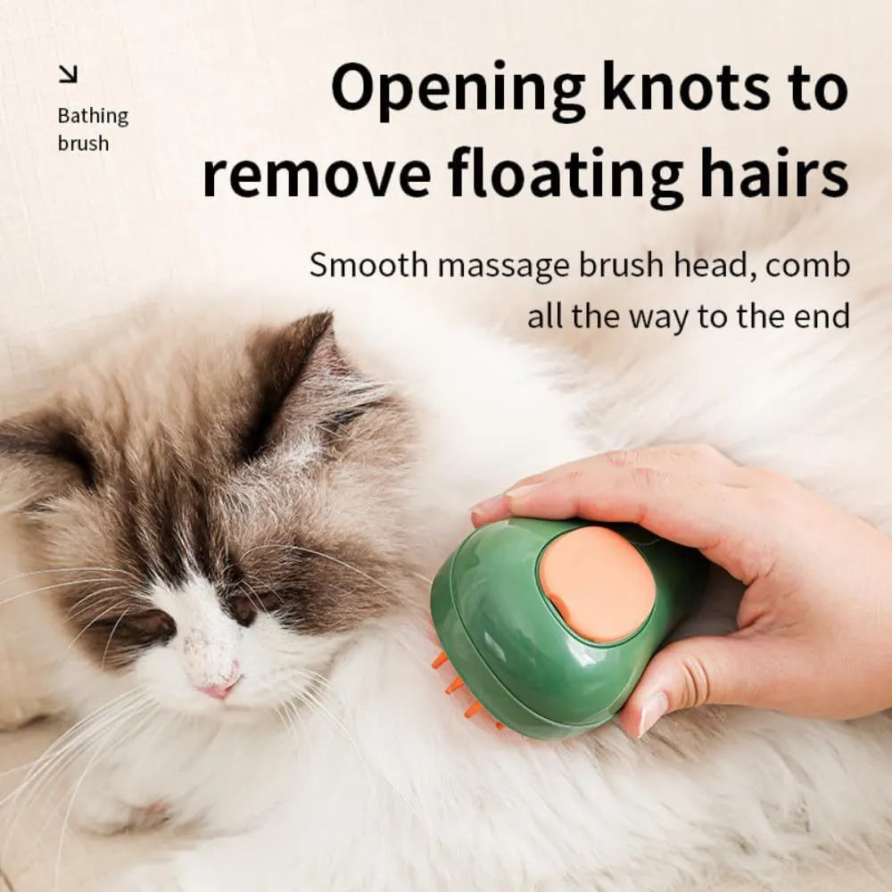 Green and white 3-in-1 cat steam brush with water spray and soft silicone teeth for pet grooming.