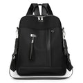 Soft black PU backpack showing three-dimensional front pocket and large main compartment.