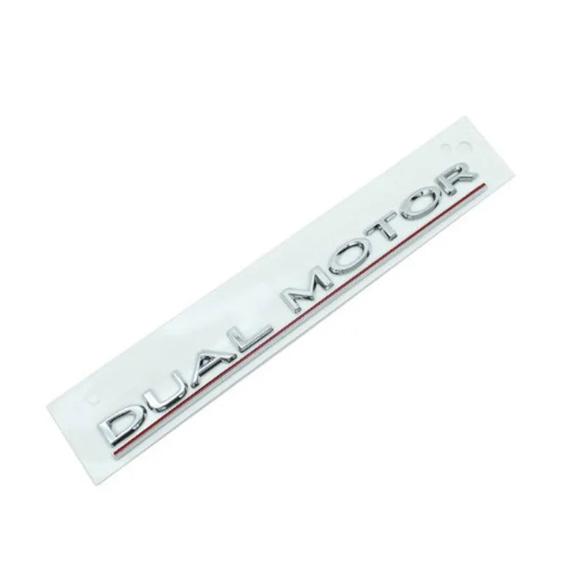 Tesla Model 3 rear bumper sticker in ABS plastic, showing matte black and silver colour options.
