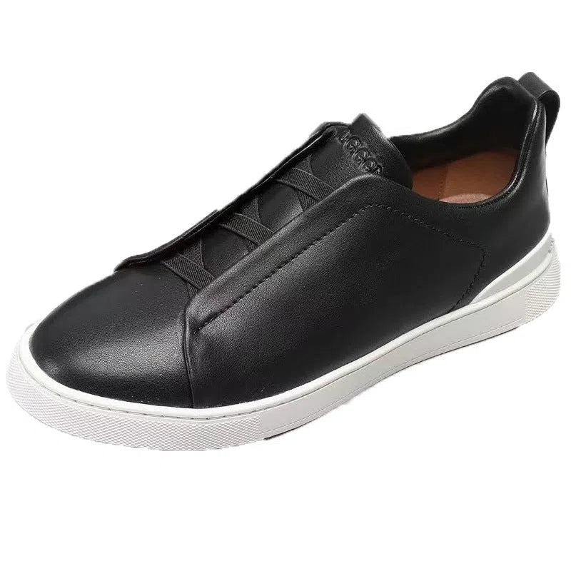 Men's genuine leather cross-strap casual shoes with cowhide upper, round toe, flat heel, and front laces