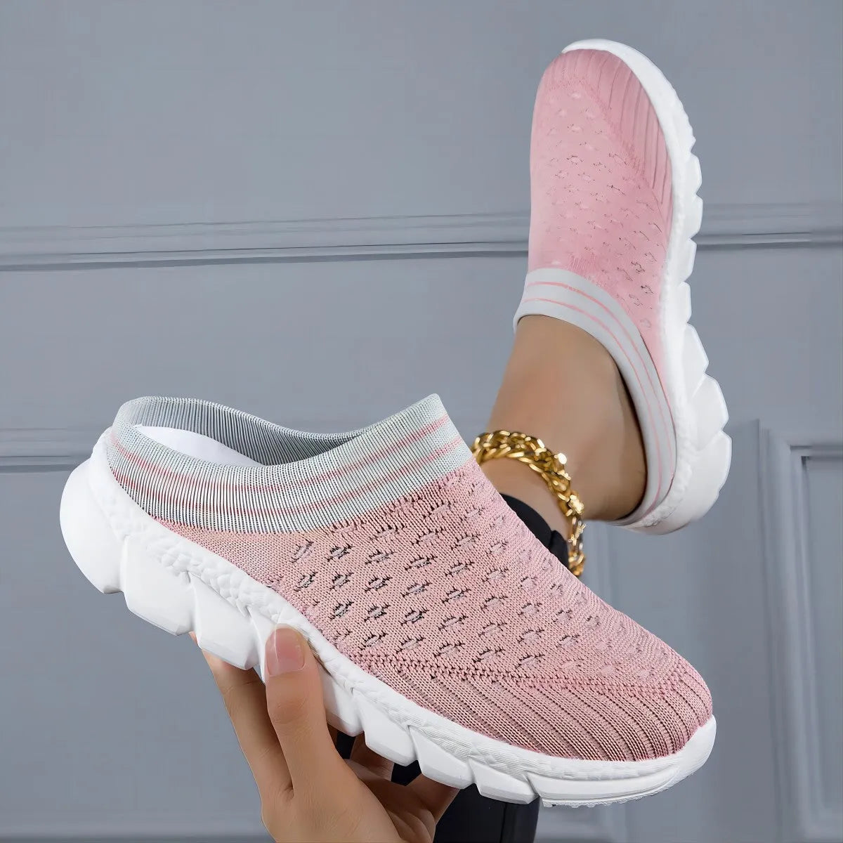 Women's Flyknit slip-on shoes with striped pattern and hollowed-out design in black colour