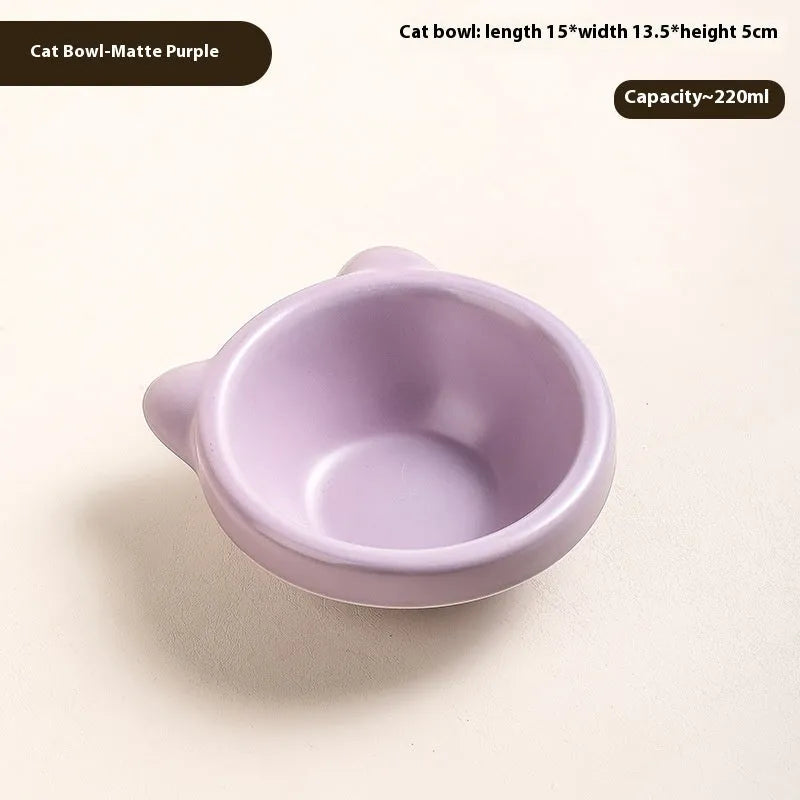 Porcelain cat drinking water bowl in bright red single grid configuration on surface