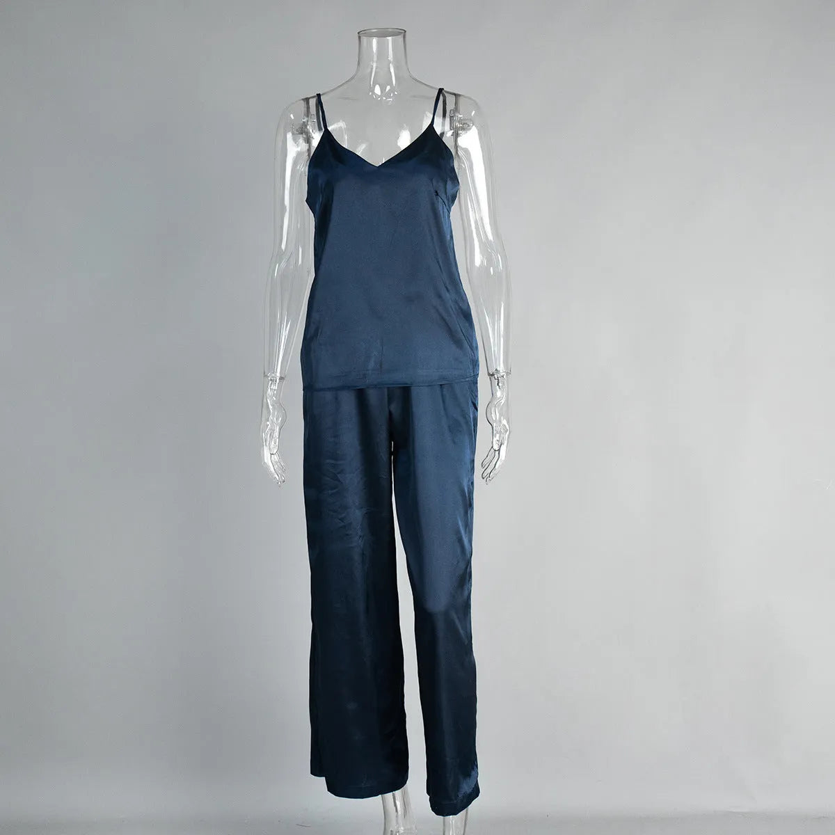 Suspender trousers pajama set in navy blue polyester with adjustable straps on the trouser waist