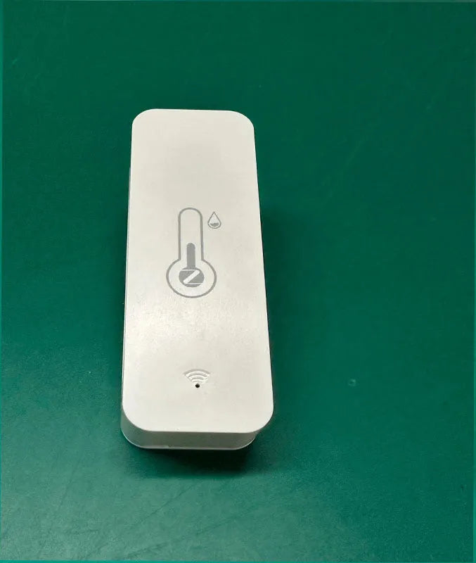 WiFi and Zigbee temperature humidity sensor in ABS plastic case measuring 72mm