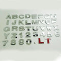 3D metal car bumper stickers showing individual zinc alloy letters in silver and black finishes