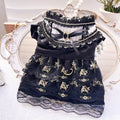 Golden tiered gothic-style skirt for a small dog on a mannequin, showing princess design.