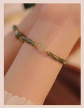 Traditional Hetian jade bracelet with geometric round design in Yuan dynasty smoked style for women