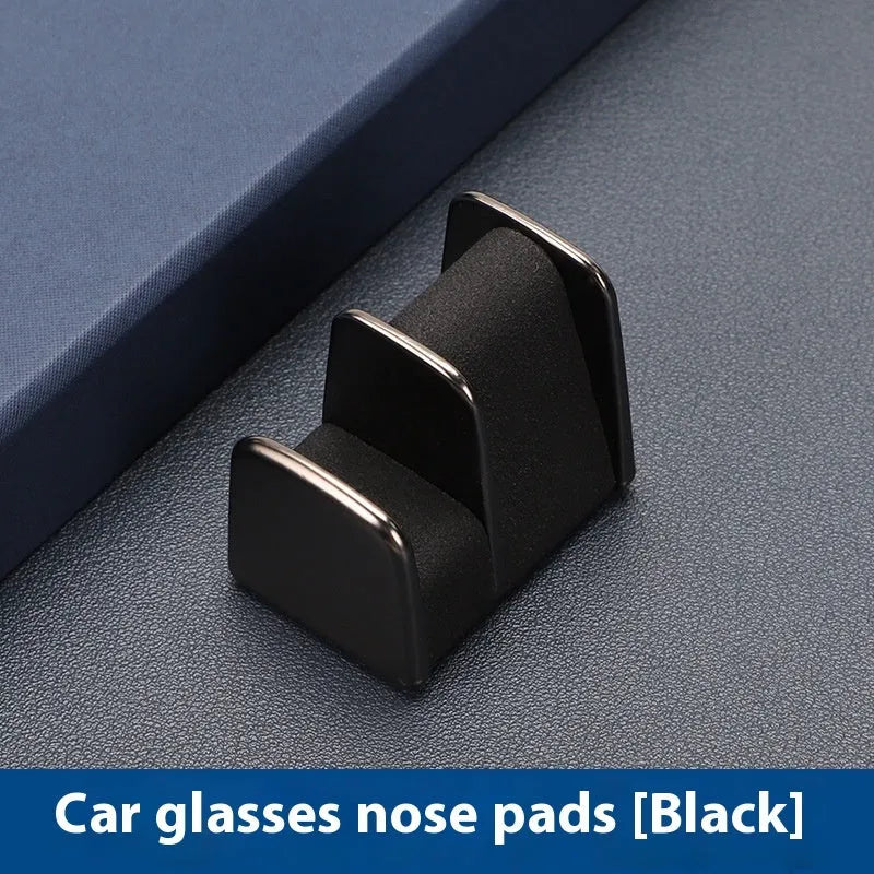Car dashboard sunglasses clip in four colours: black, grey, green, and red.