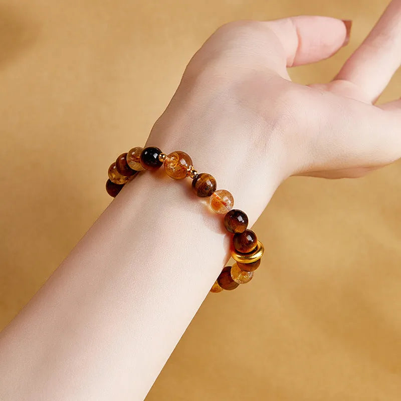 Women's sterling silver tigereye bracelet with 8mm dome tiger beads and certificate