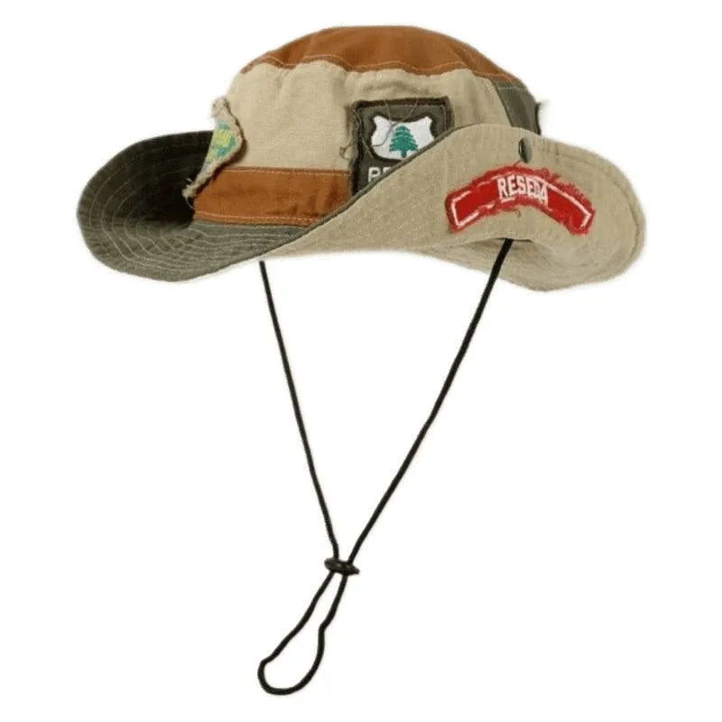 Army green cotton fisherman hat with a patchwork design and a flat-top crown.