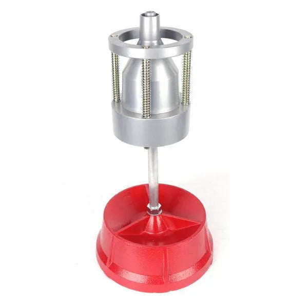 Portable aluminium hub balancer for car tyres with bull's eye level on enamel base.