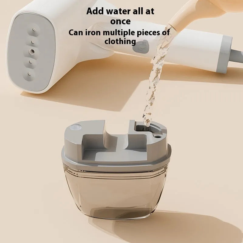 Blue handheld garment steamer with water tank and temperature controls