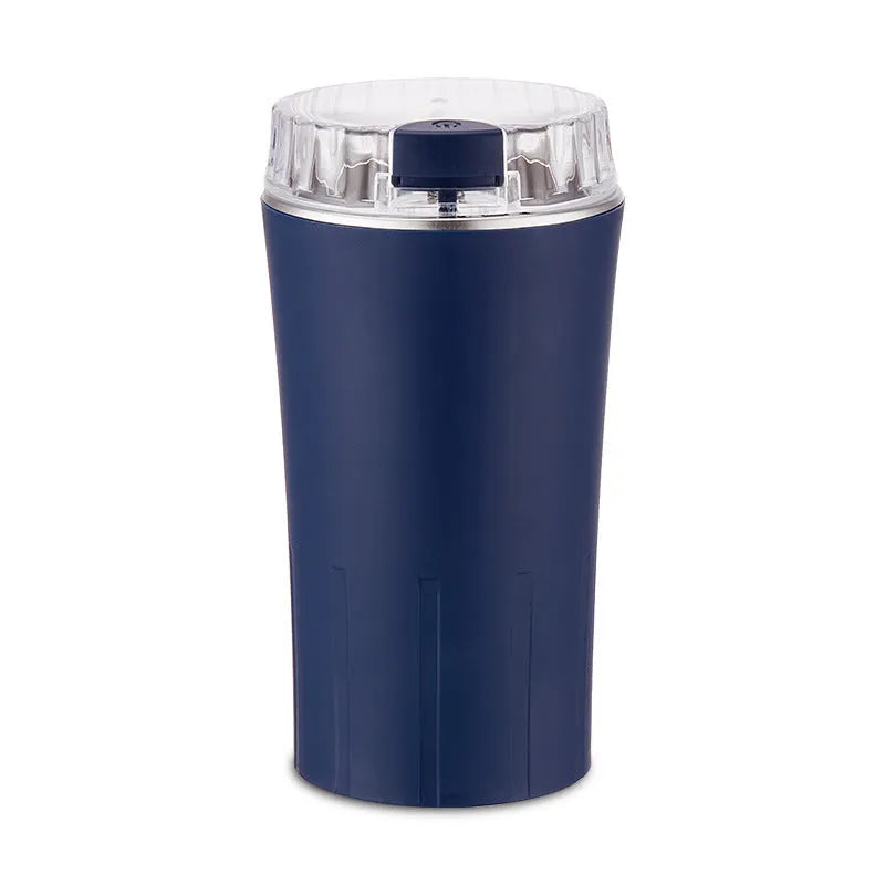 Blue mini flour mill and grinder machine for spices and grains with adjustable settings.
