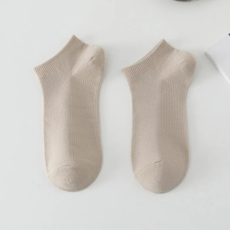 Men's solid colour polyester low-cut boat socks shown in multiple colour options