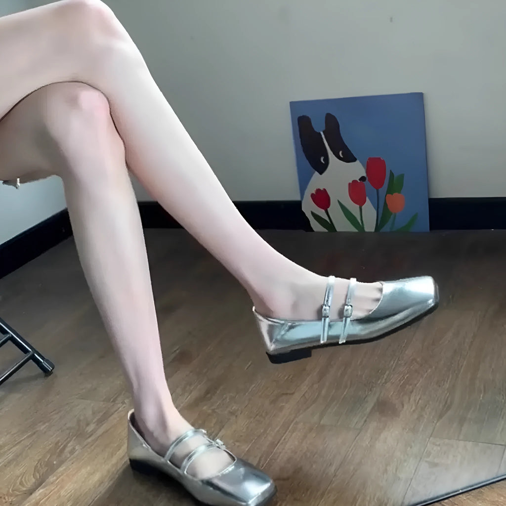 Women's silver genuine leather Mary Jane shoes with a cross buckle strap and flat sole.