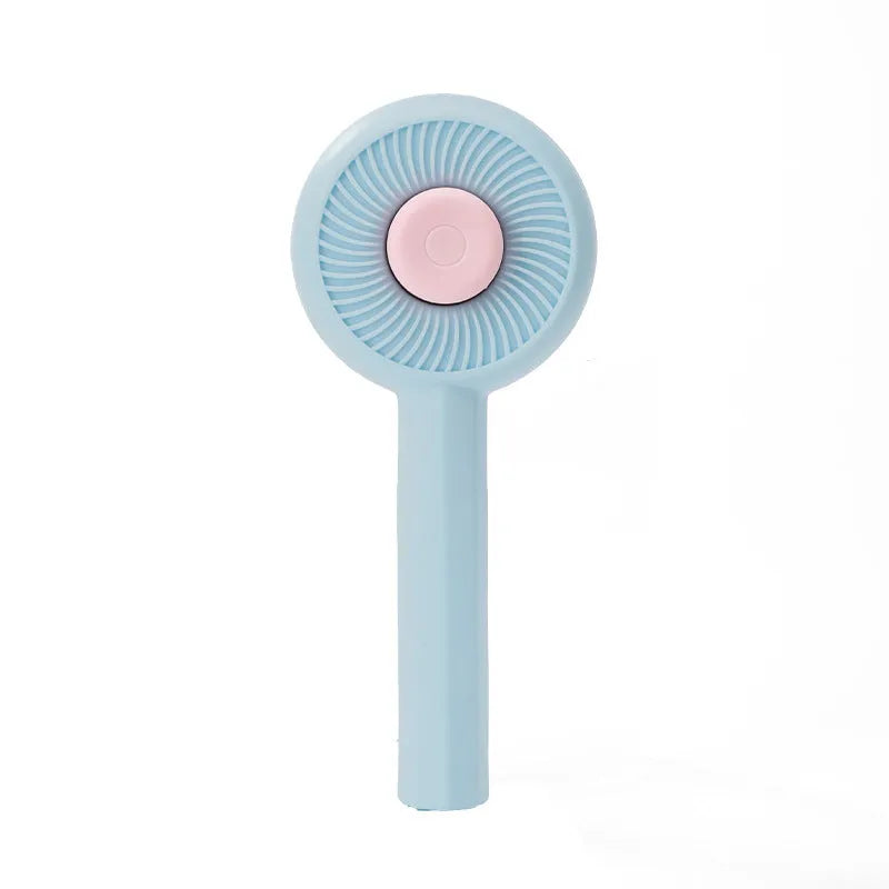 Blue and yellow pet grooming brush with metal pins and a self-cleaning button on the handle.