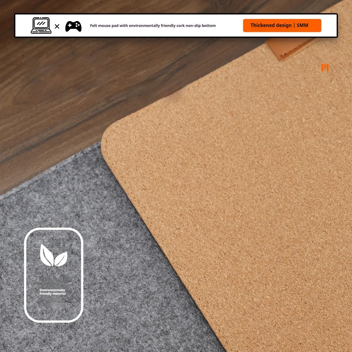 Oversized felt cork desk mat in black and grey pattern on a wooden desk