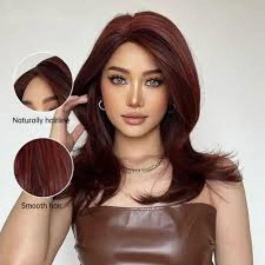 Mid-length curly synthetic wig with long bangs in a gradient colour.