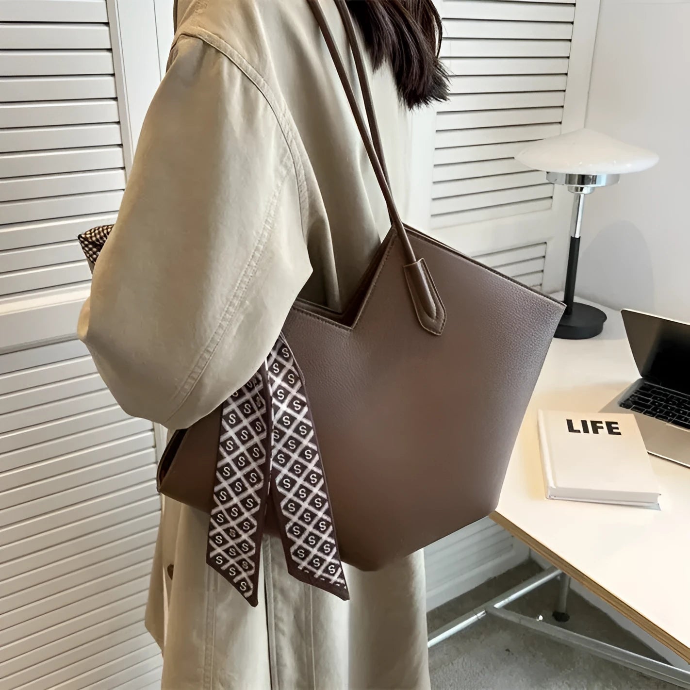 A beige women's large capacity PU shoulder bag with a square shape and a front sandwich pocket.