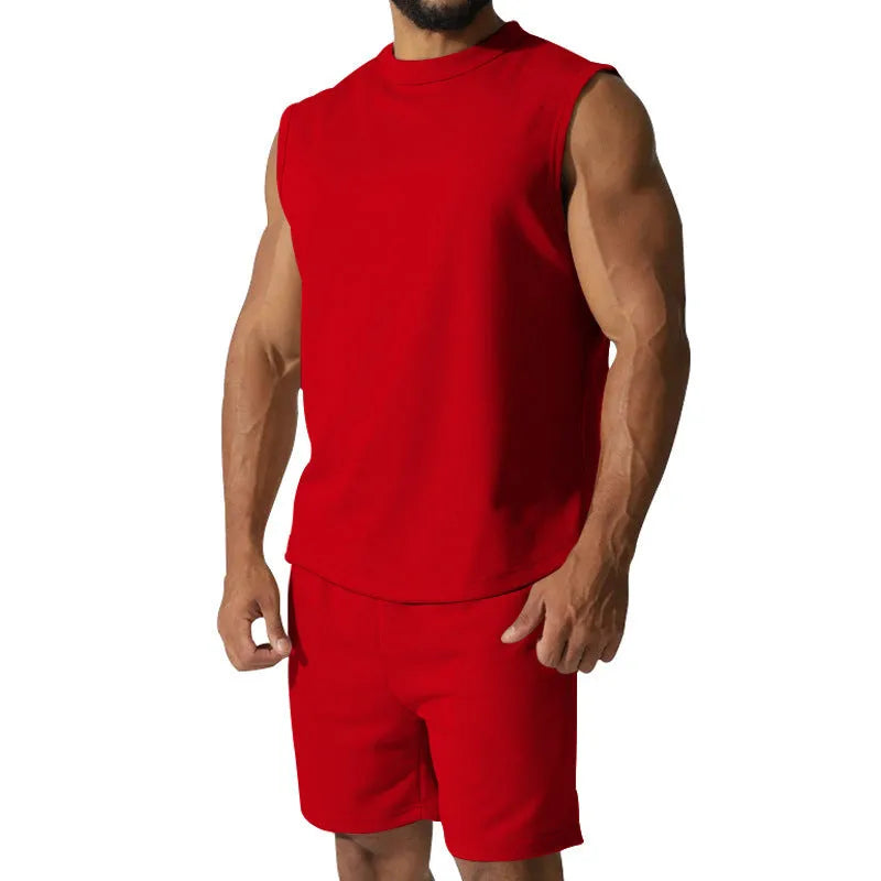 Men's sleeveless cotton blend sports top and matching shorts in a solid colour, laid flat.