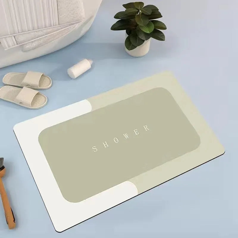 Super absorbent oval bath mat in grey with non-slip rubber bottom, 40x60cm