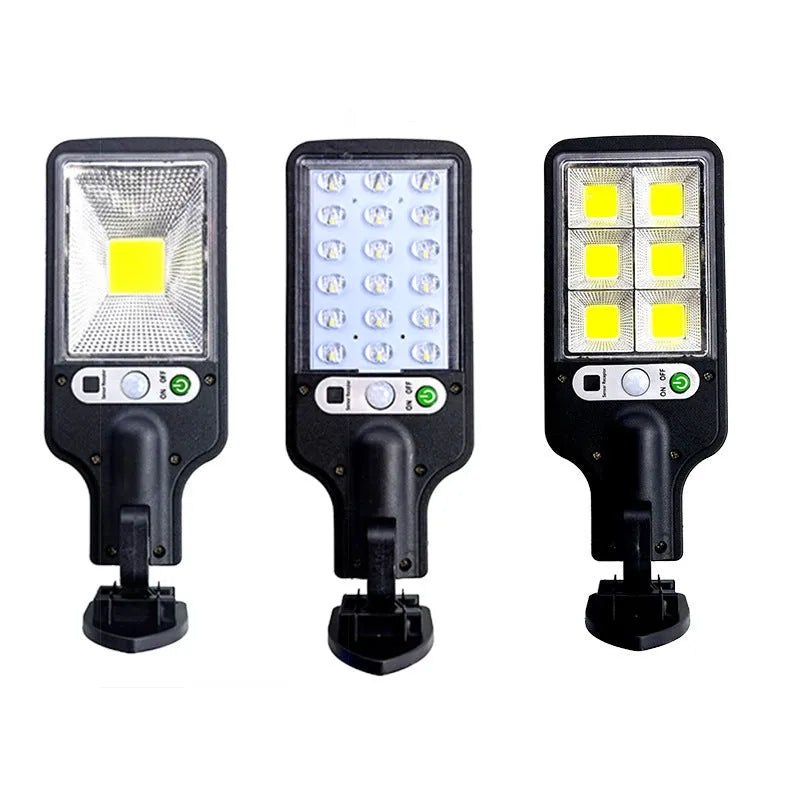 Outdoor solar LED wall lamp 28LED variant mounted on a garden fence for patio lighting