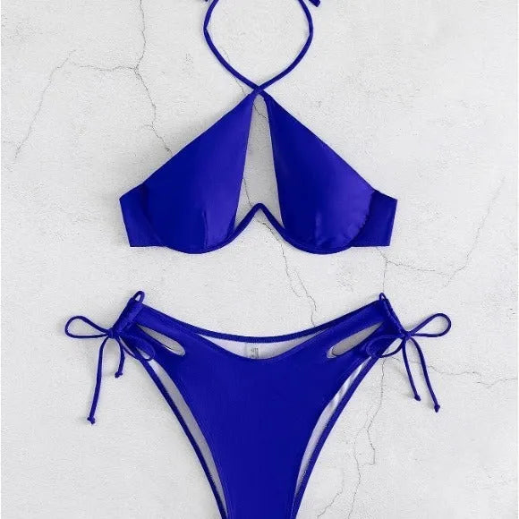 Women's brown halter neck bikini set with brief bottoms on a mannequin.