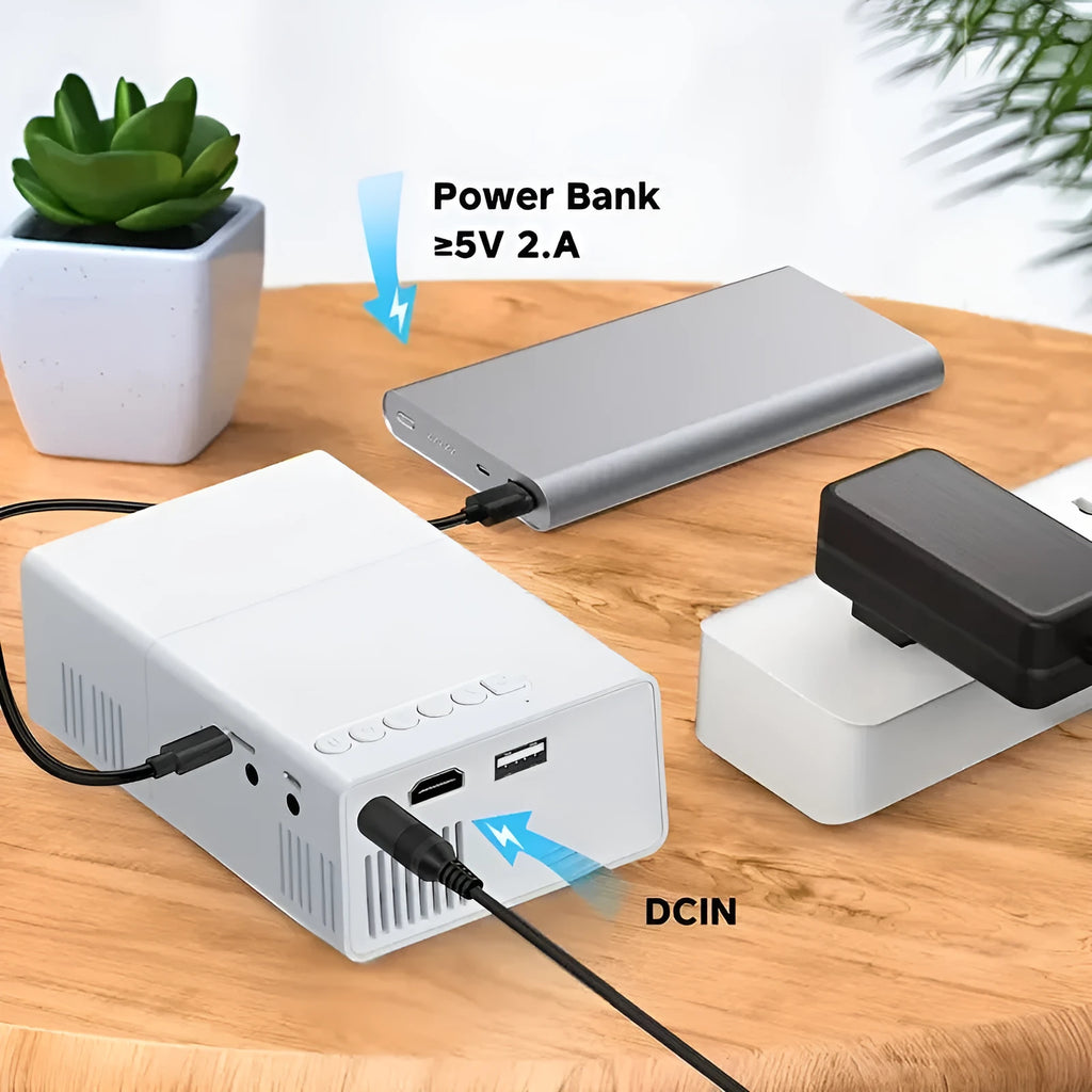 White and black portable M100 LED mini projector showing remote control and cables for 100-inch home projection.