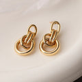 Gold geometric copper earrings with irregular shape for women