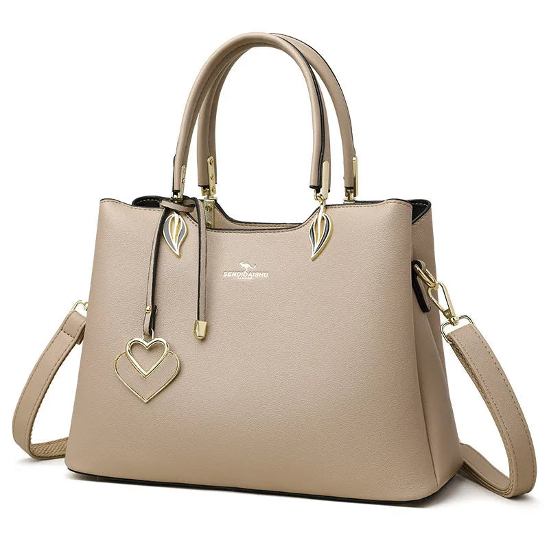Women's multi-layer shoulder messenger bag in PU material showing compartment design